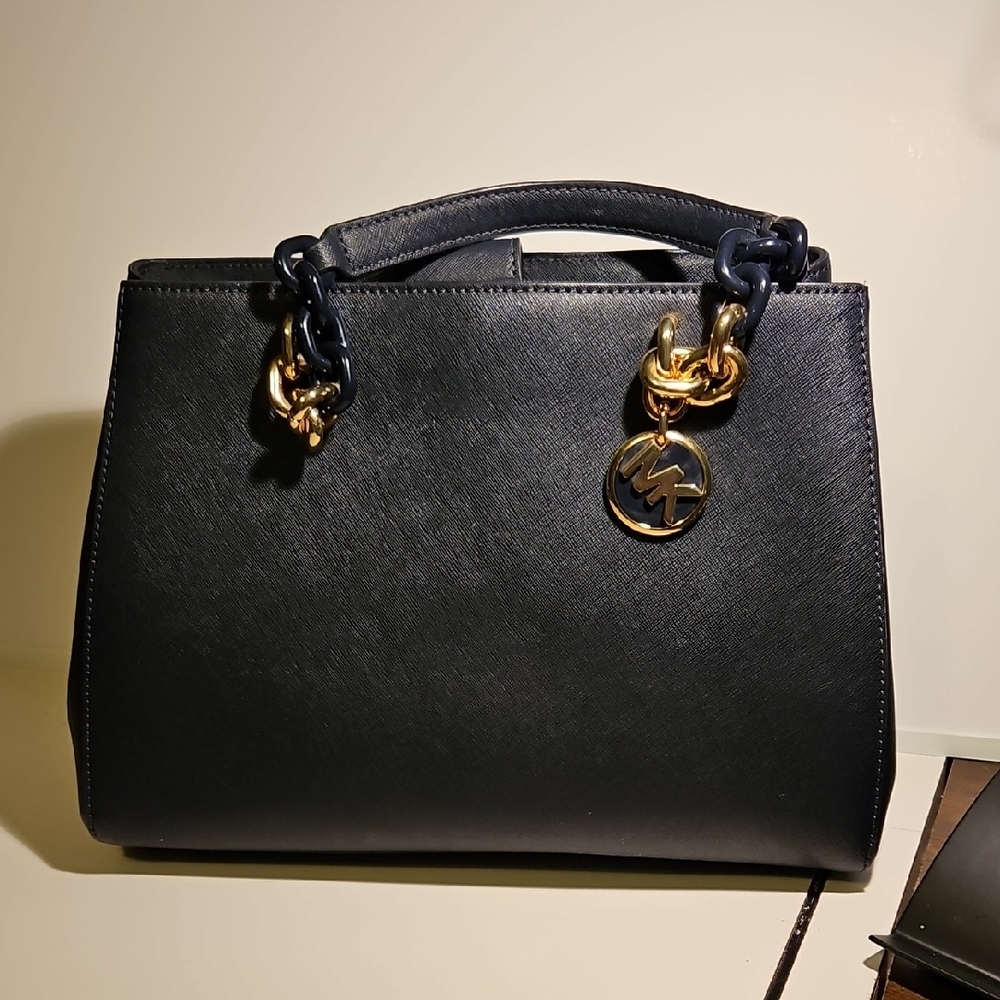 Elegant Black Handbag with Gold Accents